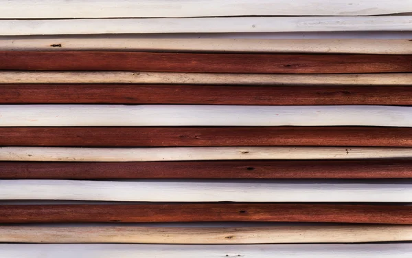 Wooden background from painted white, ivory and brown twigs — Stock Photo, Image