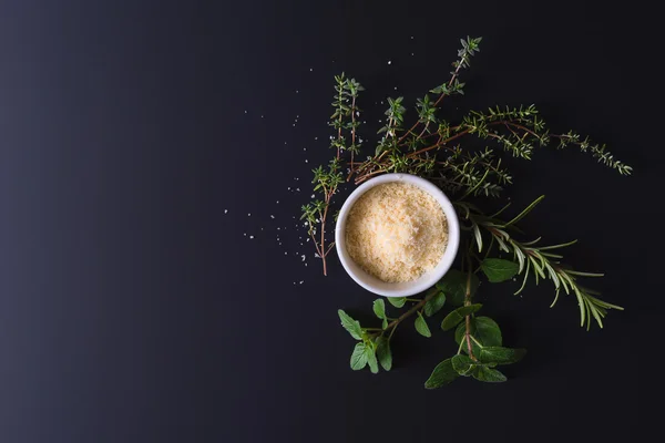 Parmesan and aroma herbs — Stock Photo, Image