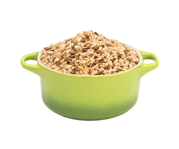 Raw brown rice in ceramic pot — Stock Photo, Image