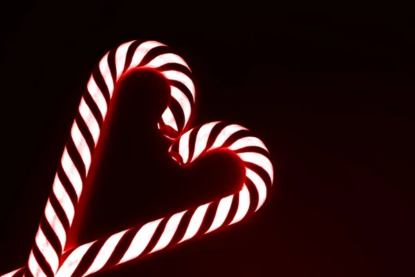 Heart from candy canes — Stock Photo, Image