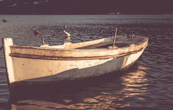 Old boat on sunset — Stock Photo, Image