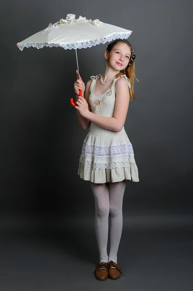 Girl in a linen sundress under parasol — Stock Photo, Image