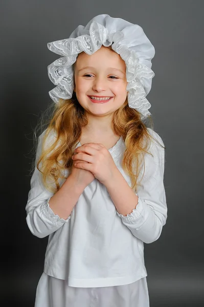 Girl in dress rustic vintage on a gray background — Stock Photo, Image