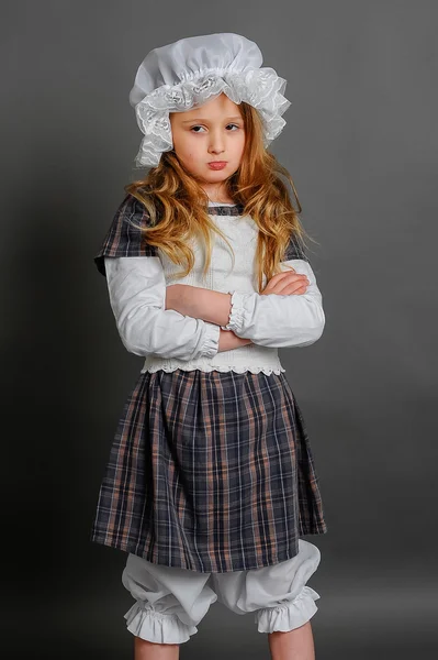 Girl in dress rustic vintage on a gray background — Stock Photo, Image