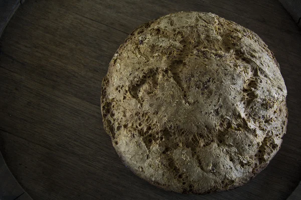 Homemade bread without yeast, gluten-free, baking powder. Eco bread on a wooden barrel.
