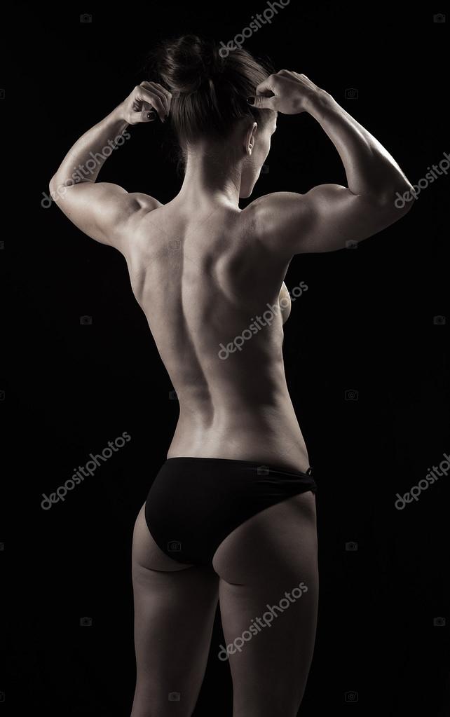 Back of toned female showing muscles Stock Photo by ©ianthraves