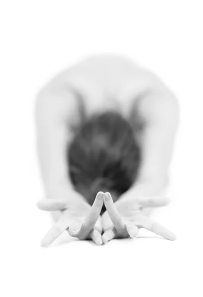 Donna che esegue posizioni Yoga Fotografia Stock