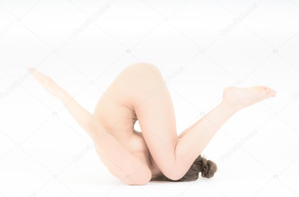 Woman performing Yoga positions Stock Photo by ©ianthraves 99589804