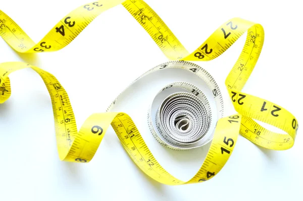 Vegetables and fruits for weight loss, a measuring tape, diet, weight loss — Stock Photo, Image