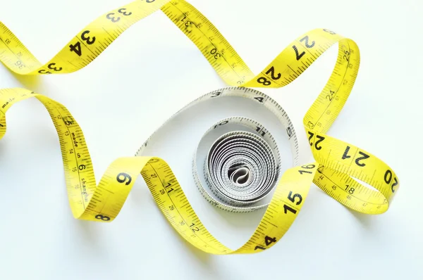 Vegetables and fruits for weight loss, a measuring tape, diet, weight loss — Stock Photo, Image