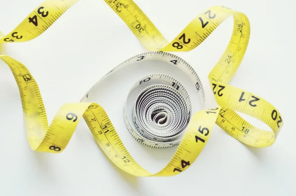 Vegetables and fruits for weight loss, a measuring tape, diet, weight loss — Stock Photo, Image