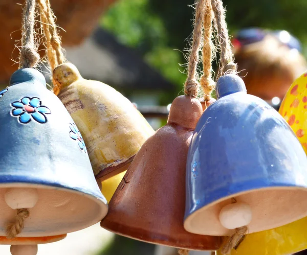 Closeup on handmade traditional ceramic jingle bells with ethnic ornament — Stock Photo, Image