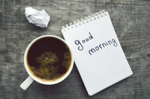 E-book.Notepad,reading glasses,hot Cup of coffee on wooden background. — Stock Photo, Image