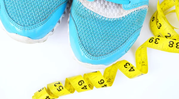 Sneakers, centimeter, røde æbler, vægttab, løb, sund kost, sund livsstil forestille - Stock-foto