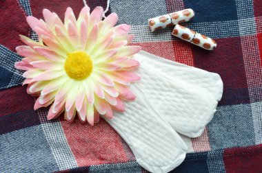 Cotton tampons, orange Gerber and sanitary pads clipart