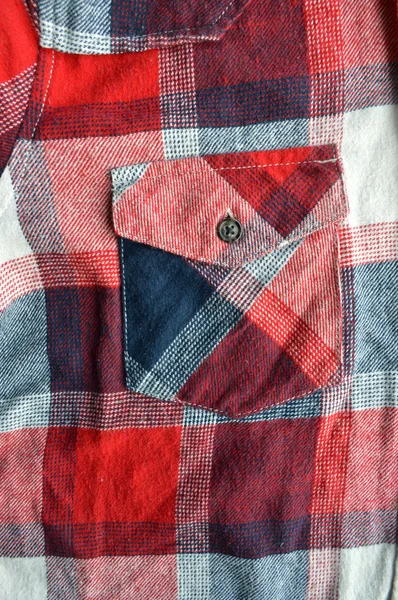 スタイルのシャツに赤の格子縞のボタンの詳細. — ストック写真