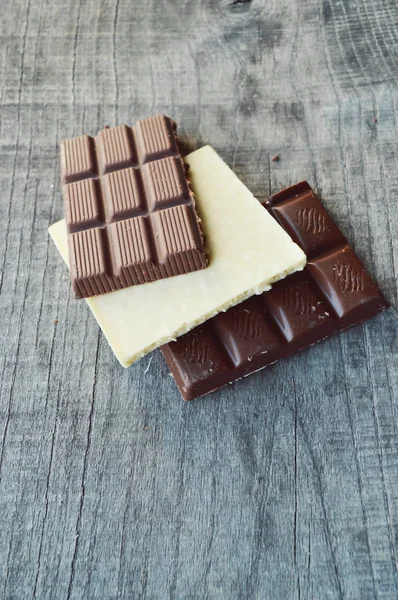 Varios trozos de chocolate — Foto de Stock