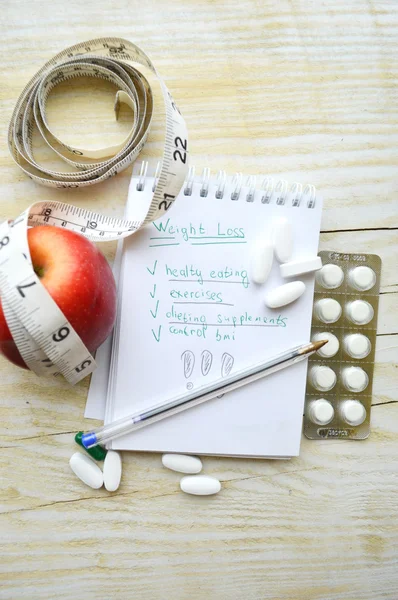 Deportes, fitness, grabación, bloc de notas, concepto de pérdida de peso, dieta, nutrición —  Fotos de Stock