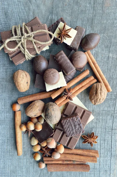 Chocolates with hazelnuts, walnuts, cinnamon and  anise — Stock Photo, Image