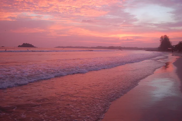 Solnedgang på stranden – stockfoto