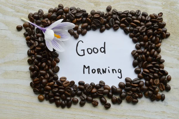 Buen signo de la mañana con granos de café — Foto de Stock