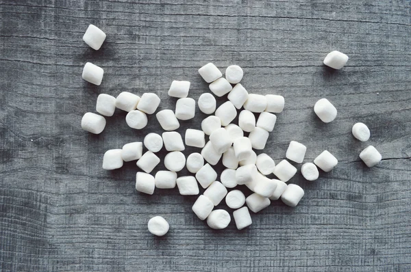 Marshmallows on wooden table — Stock Photo, Image