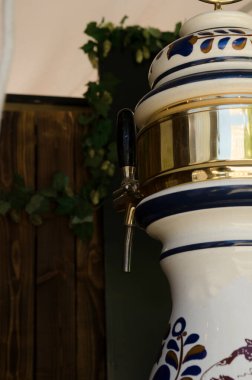 Craft beer vending machine with spout, made of German-style ceramic