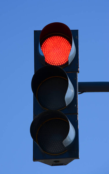 traffic light with the red light on, traffic signal stop, stop, do not continue and danger