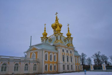 The Peterhof Palace(Petrodvorets) with snow, tree and alley. State Museum. Palace and park referred to Russian Versailles, St. Petersburg, Russia. Feb. 2017.