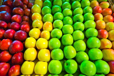 The interior of the famous Eliseevsky grocery store. Rows of apples. It is neo-baroque style supermarket. Moscow, Russia. Mar. 2017.