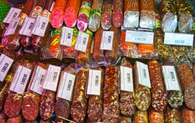The interior of the famous Eliseevsky grocery store. The large assortment of sausages. It is neo-baroque style supermarket. Moscow, Russia. Mar. 2017.