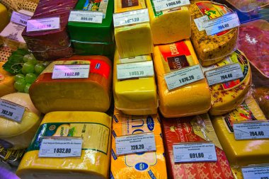 The interior of the famous Eliseevsky grocery store. A wide variety of cheeses. It is neo-baroque style supermarket. Moscow, Russia. Mar. 2017.