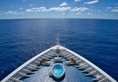 The bow of a cruise ship sailing in the Pacific Ocean. It will soon arrive in Hawaii. June 2019.