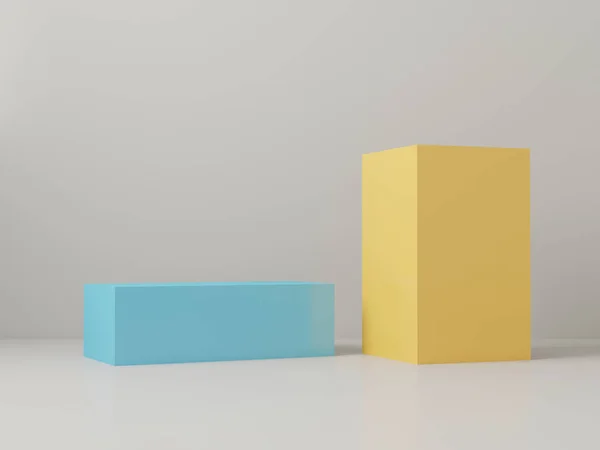 Minimalistic still life of blue and yellow two boxes grey background with soft light. Banner for a dark minimalistic site or advertisement. Mockup for small bottle advertising