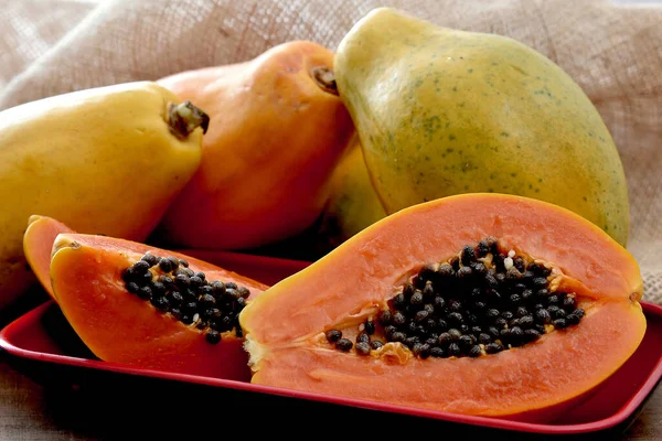 Papaya Frucht Rustikaler Stoff Hintergrund — Stockfoto