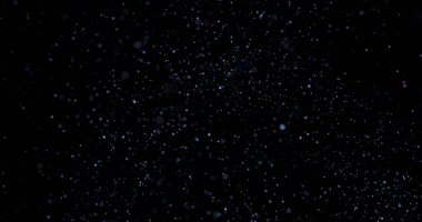 Siyah arkaplanda uçan toz parçacıkları