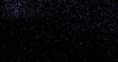 Siyah arkaplanda uçan toz parçacıkları