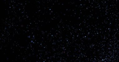 Siyah arkaplanda uçan toz parçacıkları