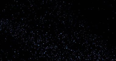 Siyah arkaplanda uçan toz parçacıkları