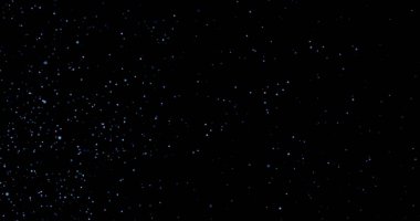 Siyah arkaplanda uçan toz parçacıkları