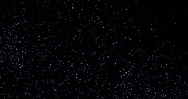 Siyah arkaplanda uçan toz parçacıkları