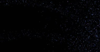 Siyah arkaplanda uçan toz parçacıkları