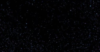 Siyah arkaplanda uçan toz parçacıkları