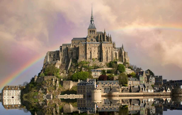 stock image clouds over Mont saint Michel abbey, normandy, france