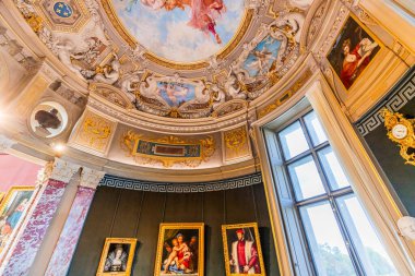 CHANTILLY, OISE, FRANCE SEPTEMBER 15, 2025 : great rotunda decors in Chateau de Chantilly by painter Paul Baudry, year 1885