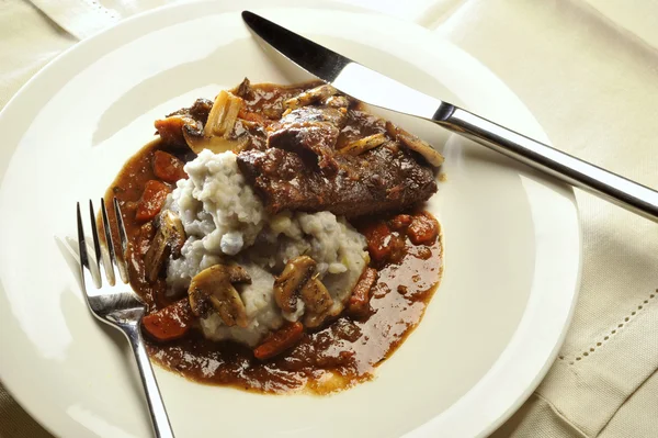 Braised beef cheeks in sauce