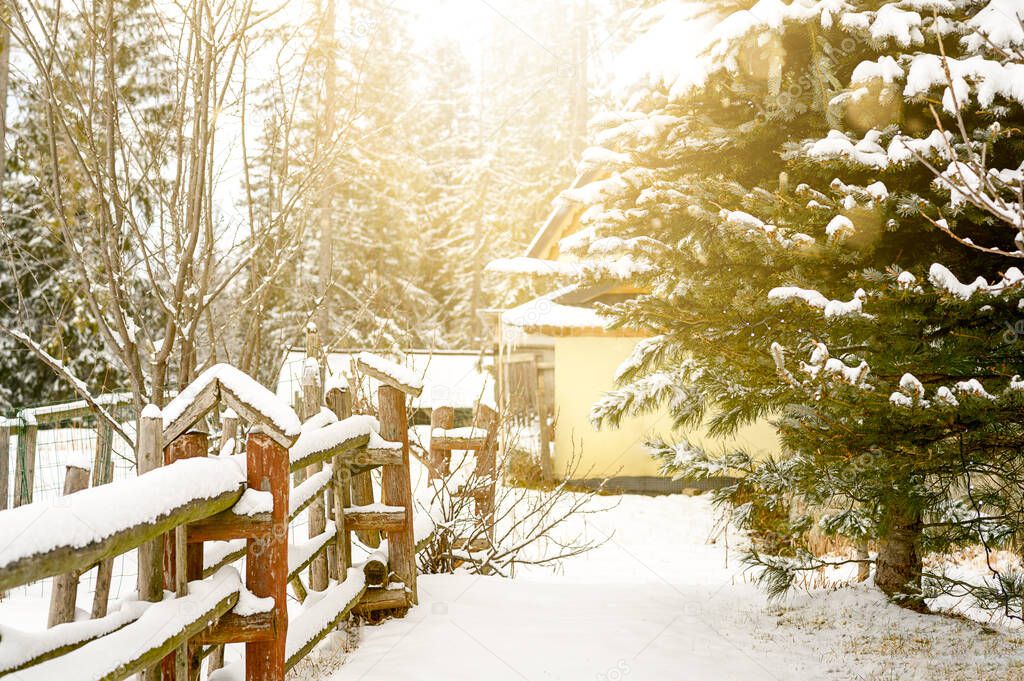 Fence and country house in snow cold winter. High quality photo