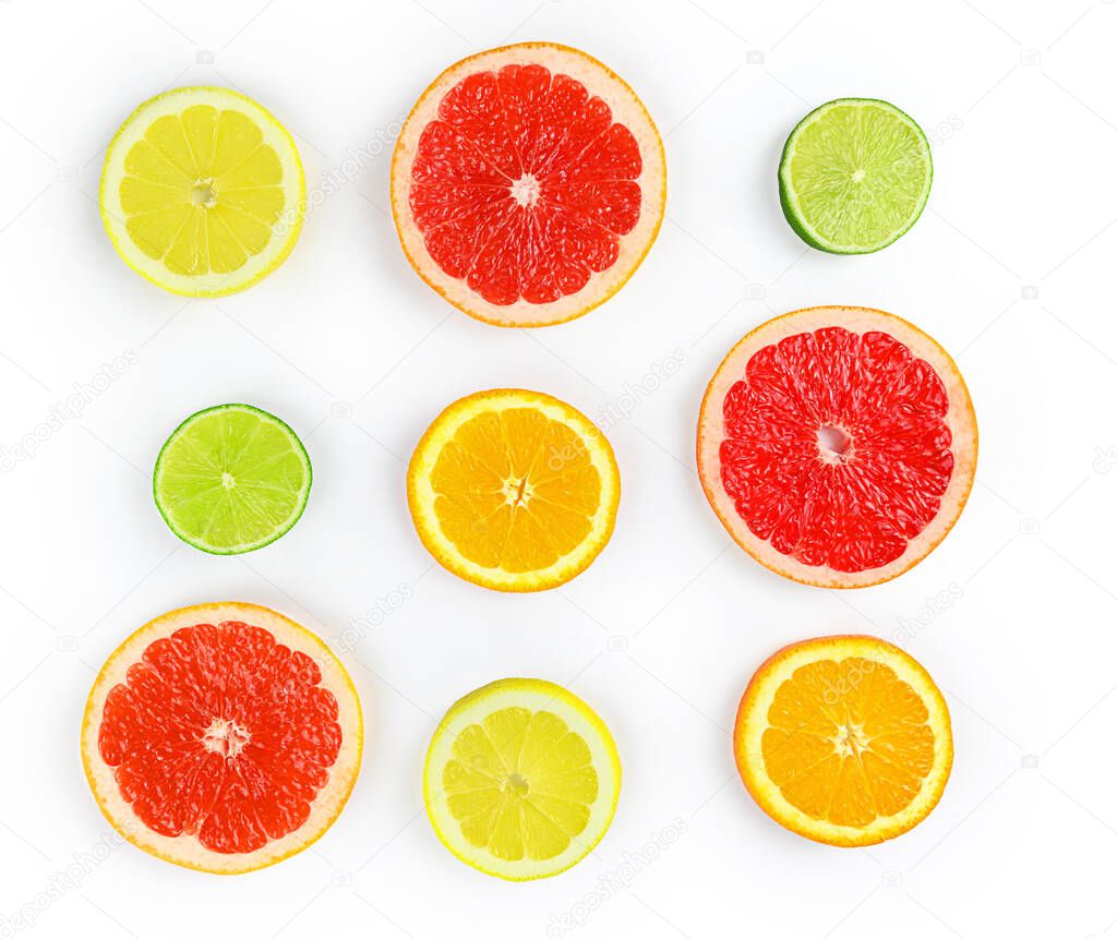 Square composition with citrus fruits, leaves and flowers on white background, isolated flat lay. High quality photo