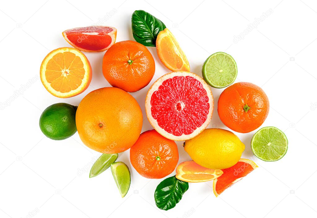 Flat lay composition with citrus fruits, leaves and flowers on white background. High quality photo
