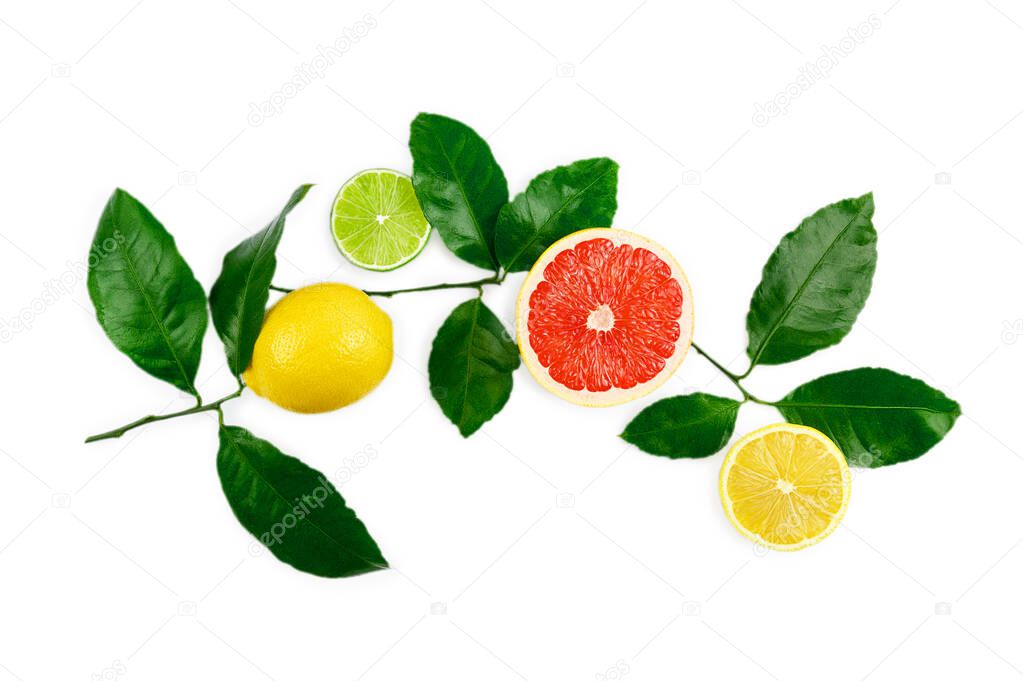 Flat lay composition with citrus fruits, leaves and flowers on white background.